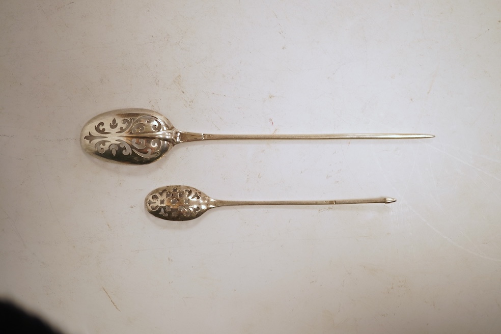 Two 18th century silver mote spoons, the largest with makers marl ?L below a crown, 13.1cm.